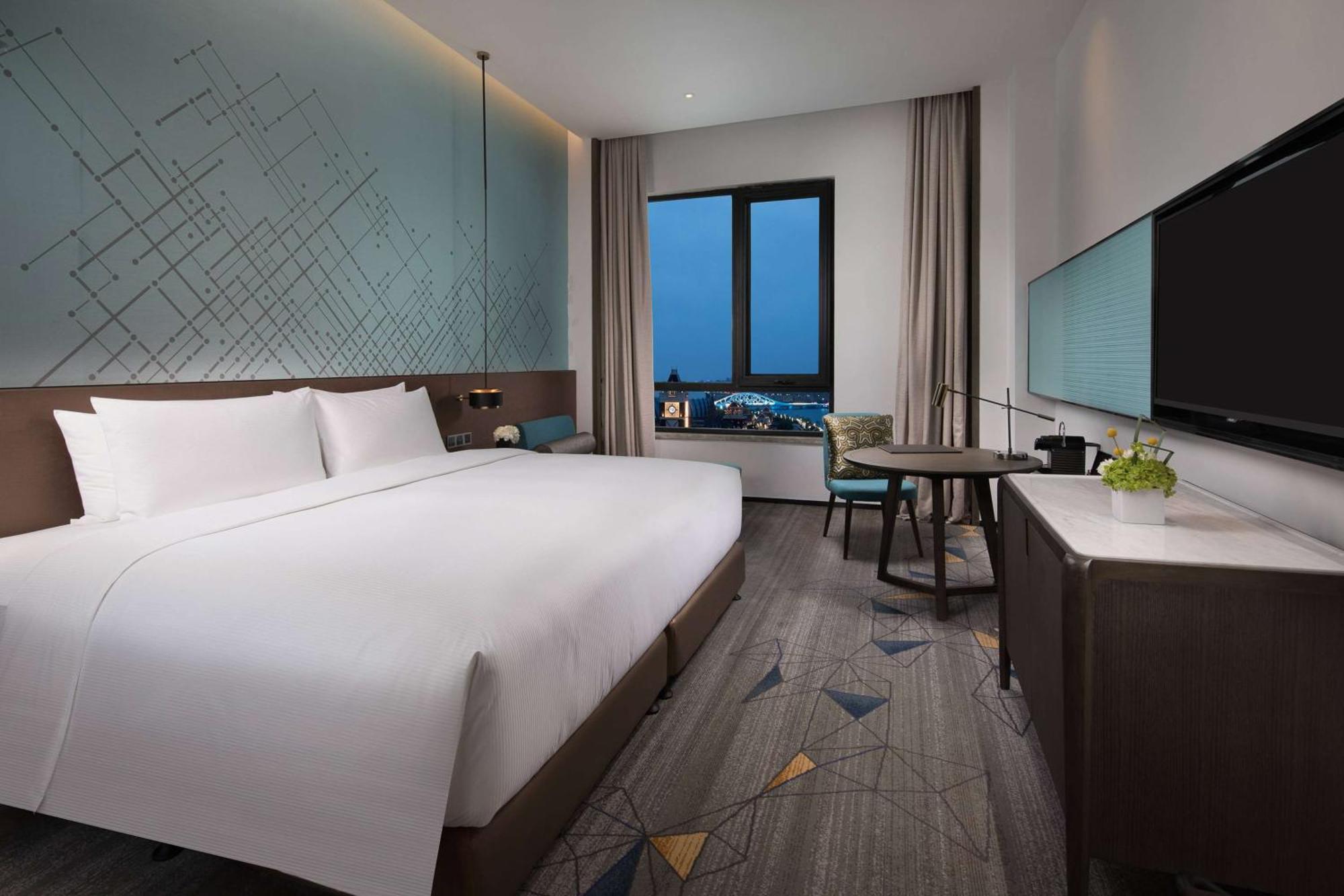 Hotel Doubletree By Hilton Qingdao Oriental Movie Metropolis Esterno foto