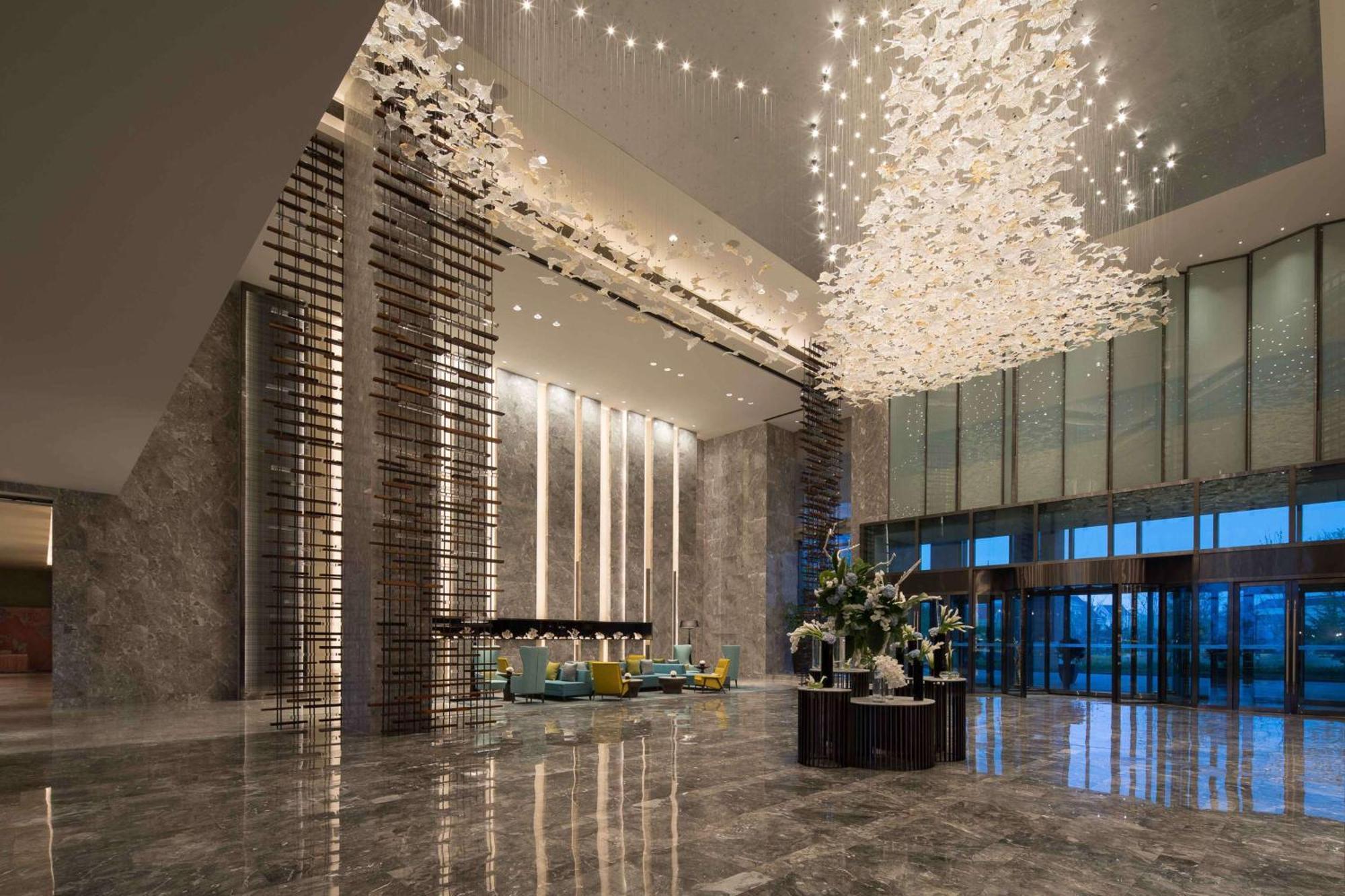 Hotel Doubletree By Hilton Qingdao Oriental Movie Metropolis Esterno foto